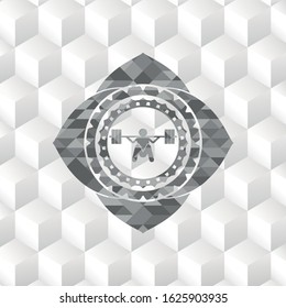 deep squat icon inside grey badge with geometric cube white background