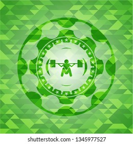 deep squat icon inside realistic green mosaic emblem