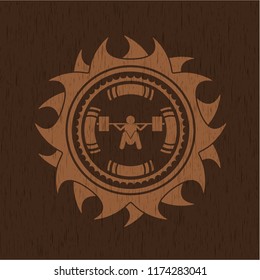 deep squat icon inside wood emblem