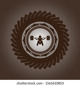 deep squat icon inside wood emblem
