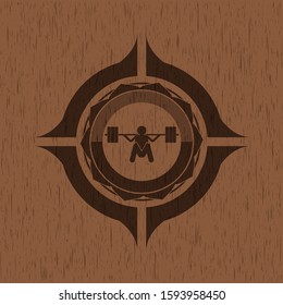 deep squat icon inside wooden emblem. Vintage.