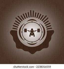 deep squat icon inside wooden emblem. 