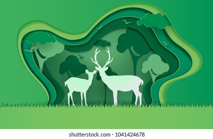 Deer in forest with snow, vector paper art and craft style illustration.