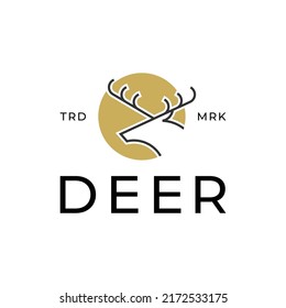 deer with golden circle logo design