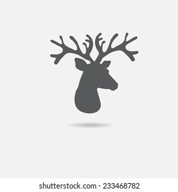 Deer head icon on grey background. Vector deer symbol