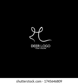 Deer Head Logo Design. The concept of a logo with an animal symbol. Beautiful deer symbol. logo Presents a feminine impression. forms Symbols H and L. Suitable for logos of beauty products, fashion 