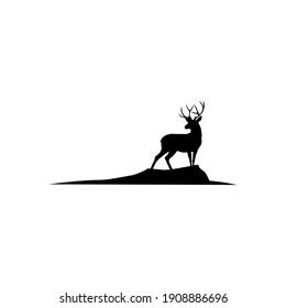 deer logo design silhouette vector. deer standing on a mountain at dawn. Element for design.