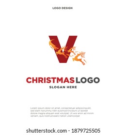 Deer Logo. Red Shape Initial Letter V with Negative Space Jumping Deer Silhouette inside isolated on Grey Background. Flat Vector Logo Design Template Element.