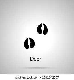 Deer paws, steps imprints, simple black silhouette on gray