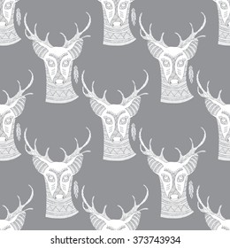 Deer seamless pattern. Lace background with deer heads. Illustration for the boho, tribal, ethnic style. Beautiful seamless pattern for fabric, background, scrap booking