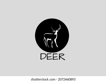 Deer silhouette logo with white light