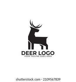 Plantilla del logotipo del vector de pie de la silueta de ciervo sobre fondo blanco. Ilustración del logotipo del vector.