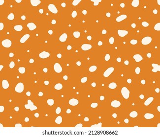  Deer skin texture seamless pattern. Perfect use for fabric, wallpaper, home decor. Vector background on brown surface. 