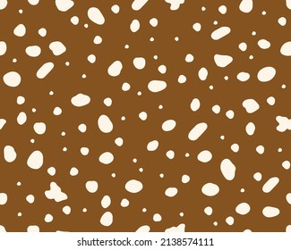  Deer skin texture seamless pattern. Perfect use for fabric, wallpaper, home decor. Abstract spots. Vector background on brown surface.