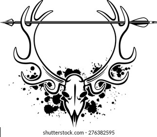 deer skull with antlers and arrow