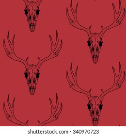 Deer skull on a red background vector seamless pattern