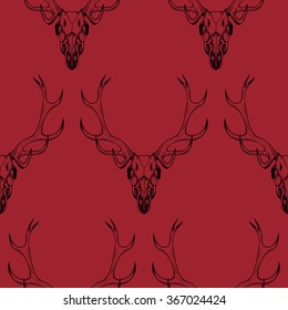 Deer skull on a red background .Vector seamless pattern