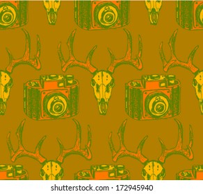 Deer skull and retro photo camera, hipster sketch pattern