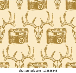 Deer skull and retro photo camera, hipster sketch pattern