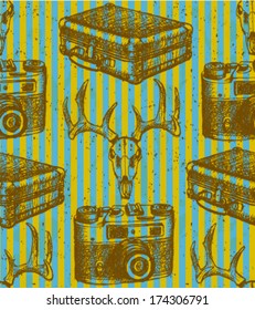Deer skull, suitcase and retro photo camera, hipster seamless pattern