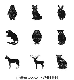 Deer, tiger, cow, cat, rooster, owl and other animal species.Animals set collection icons in black style vector symbol stock illustration web.