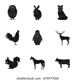 Deer, tiger, cow, cat, rooster, owl and other animal species.Animals set collection icons in black style vector symbol stock illustration web.