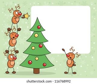Deers decorating a christmas tree.