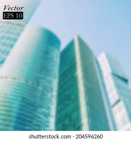 Defocused business buildings. Vector format.
