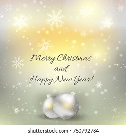 Defocused Christmas lights background with snowflakes, Christmas baubles and sparkles. Merry Christmas and Happy New year calligraphy text.