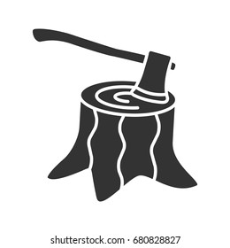 Deforestation glyph icon. Silhouette symbol. Stump with axe inside. Negative space. Vector isolated illustration