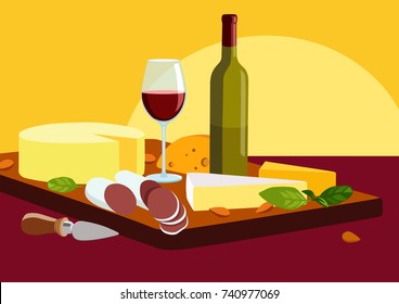 Degustation of cheese specialties and red wine. On the wooden tray are cheeses, sausage and quality wine.