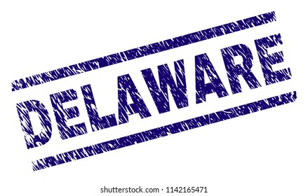 DELAWARE seal print with scratced style. Blue vector rubber print of DELAWARE label with retro texture. Text label is placed between parallel lines.