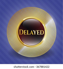Delayed gold badge or emblem