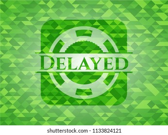 Delayed green emblem with triangle mosaic background