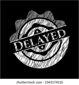 Delayed written on a chalkboard
