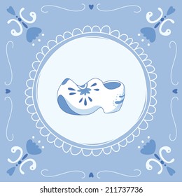 Delft blue tile with a pair of cloggs (typical Dutch shoes). EPS 10. No transparency. No gradients.