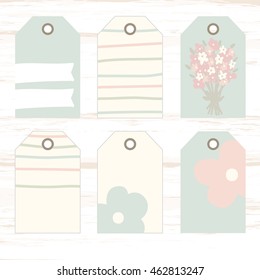 Delicate bouquet of flowers. Romantic tags collection  with flowers, lettering.  Set of  holiday invitations. Shabby chic