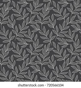 Delicate design of tender branches and leaves. Black and white vector seamless pattern