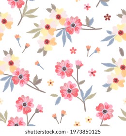 Delicate embroidery flowers on white background. Floral seamless pattern. Print for fabric and textile.