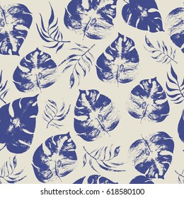 Delicate exotic tropical floral seamless pattern with Monstera and Areca Palm leaves. Monochromatic artistic hand drawn openwork stamp for print, paper, fabric