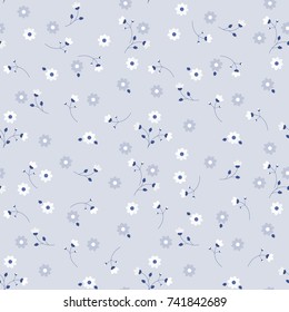 Delicate floral pattern. Seamless blue little flowers background for design textiles, wrapping, paper, wallpaper.