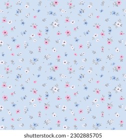 Delicate floral pattern in small abstract flowers. Small white, blue and pink flowers. Light blue background. Ditsy print. Floral seamless background. Cute template for fashion prints. Stock pattern.