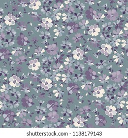 Delicate flowery pattern in blue flowers. Floral seamless background for textile, wallpapers, print, wrap and papers.