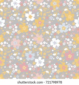 Delicate pattern in small flowers. Floral seamless background for textile, wallpapers, wrapping, paper.