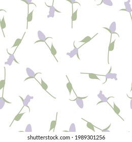 delicate pattern of trendy flowers from plant elements, buds and flowers. lilac tulips with beautiful buds on a white background