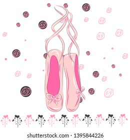 Delicate pink pointe shoes with pink ribbons for ballet dancing.