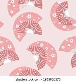 Delicate seamless fan pattern with cherry blossoms. White flowers on a pink background. Asian Japanese national accessories, style. Vector graphics.