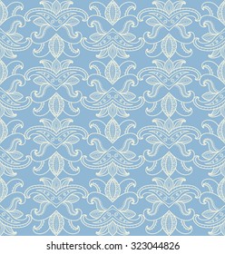 Delicate seamless pattern with abstract flowers. The ornament on a blue background