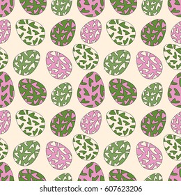 Delicate seamless pattern with random placed colorful Easter eggs. Chicken eggs colored with hearts and placed on beige background. Light spring colors. 