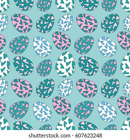 Delicate seamless pattern with random placed Easter eggs. Chicken eggs colored with hearts and placed on blue background.